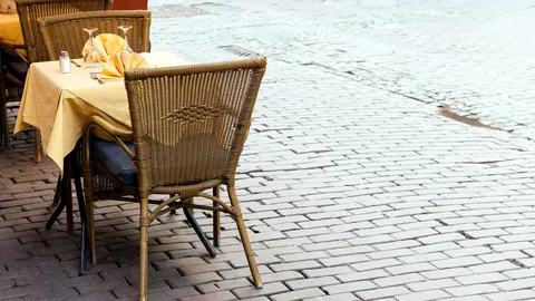 A quiet cobblestone square in Brussels as the cafes close.